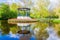 Photo of pond and beautiful blooming tulips in Vondelpark, Amsterdam.