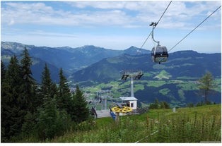 photo of beautiful alpine summer view with a church at Waidring, Tyrol, Austria.