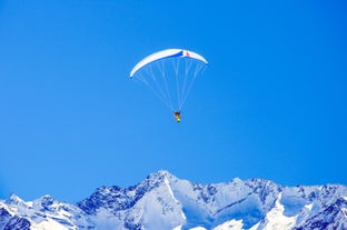 Photo of panorama of Hintertux ski resort in Zillertal Alps in Austria with the far view of ski lifts and pistes.