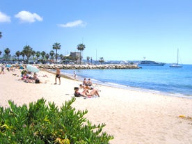 photo of harbor and town of Golfe-Juan Vallauris, commune of the Alpes-Maritimes department, which belongs in turn to the Provence-Alpes-Cote of Azur region of France.