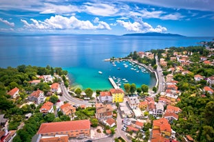 Photo of Ika village waterfront in Opatija riviera, turquoise sea and blue sky, Kvarner, Croatia.