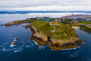 Photo of aerial panoramic view of Lugo galician city with buildings and landscape, Spain.