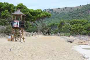 Photo of beautiful sandy beach of Cala Mesquida, Mallorca, Mediterranean Sea, Balearic islands, Spain.