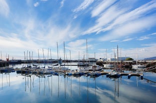 Panoramic view of Reykjavik, the capital city of Iceland, with the view of harbor and mount Esja.