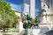 Photo of View of the stone sculpture of Miguel de Cervantes and bronze sculptures of Don Quixote and Sancho Panza on the Square of Spain (Plaza de Espana). Madrid is a popular tourist destination of Europe.