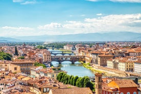 Photo of Italy Piazza Maggiore in Bologna old town tower of town hall with big clock and blue sky on background, antique buildings terracotta galleries.