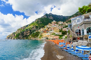 Photo of aerial morning view of Amalfi cityscape on coast line of Mediterranean sea, Italy.