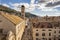 Photo of aerial view of the main street (Stradun or Placa), the Franciscan Monastery, St. Saviour Church in Dubrovnik, Croatia.