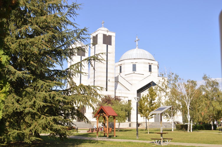 The green park in Niš with old orthodox Church. The centar of Medijana municipality.