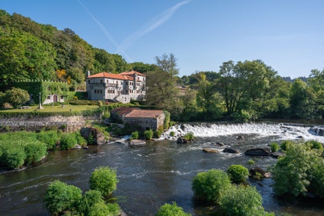 Photo of general plan of the beautiful village of Ponte Maceira, La Coruña, in Spain.