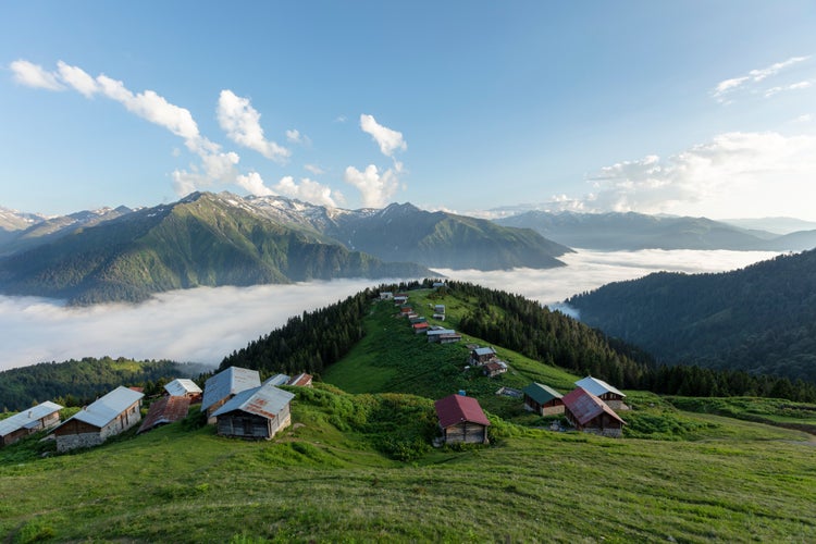 Photo of traditional wooden houses at highlands ,Pokut, Rize, Turkey.