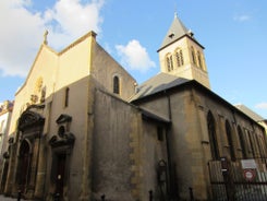 Photo of Metz city view of Petit Saulcy an Temple Neuf and Moselle River in Summer, France.