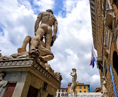 photo of Sculptures of David and Hercules killing Cacus in Piazza Signoria, Florence, Italy .