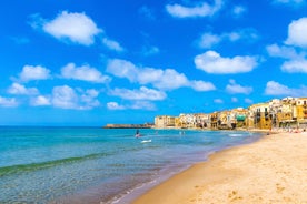 Photo of view of Cefalu and Promontorio de Torre Caldura seen from Norman Castle, La Rocca park, Italy.