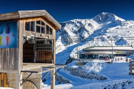 Photo of panorama of Hintertux ski resort in Zillertal Alps in Austria with the far view of ski lifts and pistes.