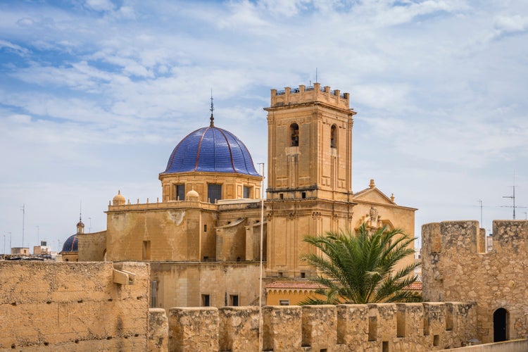 Photo of blue dome and bell tower of the Santa María Basilica of Elche, Alicante, Valencia, Spain.