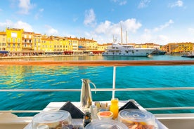 Photo of beautiful aerial view of Saint-Tropez, France with seascape and blue sky.