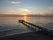 Photo of sunset to the pier of Marina di Pietrasanta ,Italy.