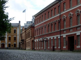 Early autumn morning panorama of the Port of Turku, Finland, with Turku Castle at background.