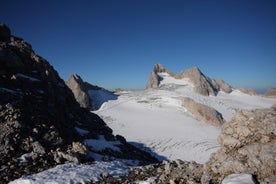 Photo of Suspension Bridge of Dachstein Skywalk viewpoint in Austria, with people, in Ramsau am Dachstein.