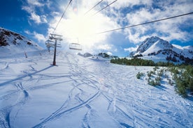 photo of Mountains in Androrra and ski cable car over the valley of Soldeu - Pas de la Casa.