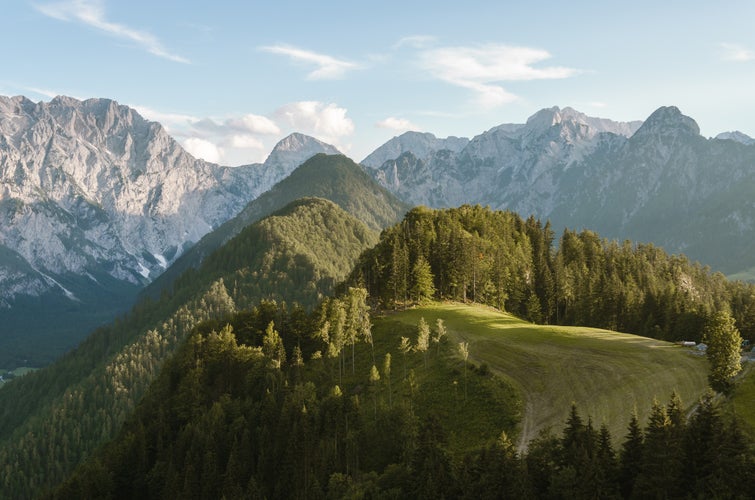 Photo of Afternoon light on the alpine pastures and peaks of the Kamnik Alps from the Logar valley (Logarska Dolina) panoramic road, Solcava, Slovenia.