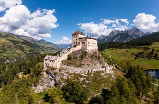 Photo of  beautiful Scuol town in Swiss Alps and Inn river, Switzerland.