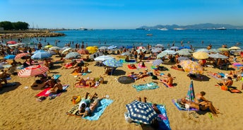 Photo of aerial cityscape view on French riviera with yachts in Cannes city, France.