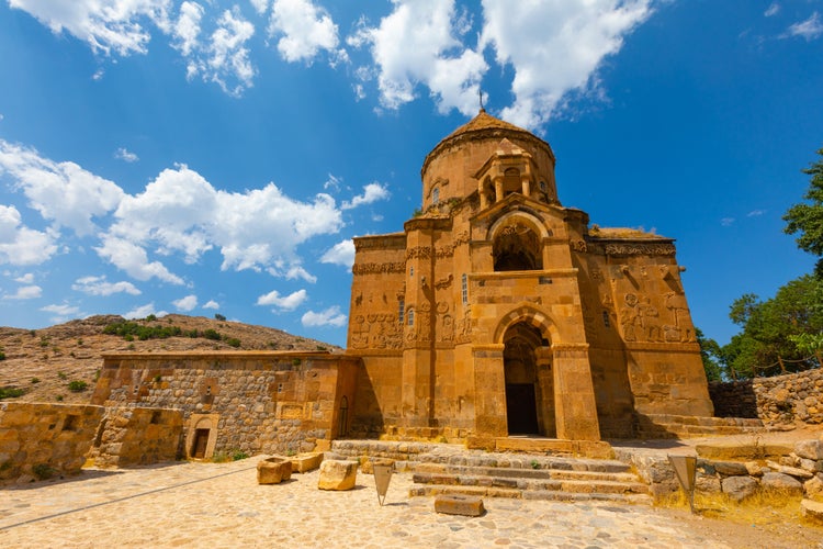 photo of view of The Cathedral of the Holy Cross on Akdamar Island, in Lake Van in eastern Turkey, is a medieval Armenian Apostolic cathedral, built as a palatine church for the kings of Vaspurakan.