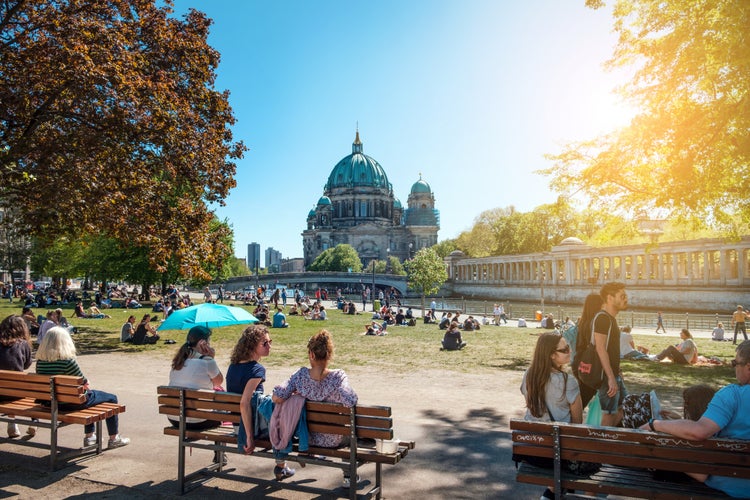 People in public park on a sunny day near Museum Island and Berlin Cathedral.jpg