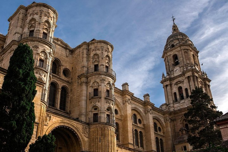 A stunning view of the Malaga Cathedral showcasing its intricate architecture and historical significance in Spain..png