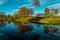 Photo of The Duthie park, Aberdeen, Scotland, with reflections in the early morning light.