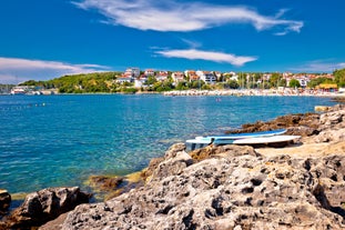 Photo of aerial view of beautiful town of Medulin waterfront view, Istria region of Croatia.