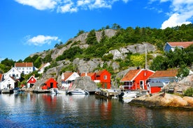 Photo of landscape with mountains, river and buildings in Lillehammer town, Norway.