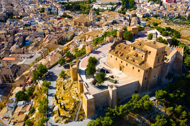 Photo of Panoramic aerial view of Caravaca de la Cruz cityscape overlooking medieval fortress and basilica, Murcia, Spain..