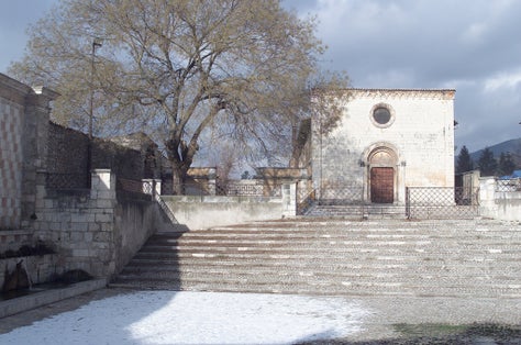 Fountain of the 99 Spouts, Historic fountain with 99 jets distribuited along three walls, L Aquila, Italy.