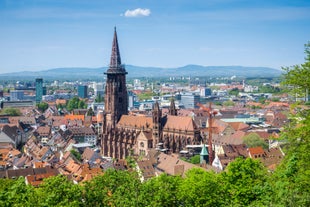 Photo of aerial panoramic view of Hohes Schloss Fussen or Gothic High Castle of the Bishops and St. Mang Abbey monastery in Fussen, Germany.