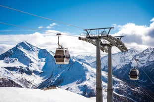 photo of panoramic view of Sestriere village from above, famous ski resort in the Italian western Alps, Piedmont, Italy.