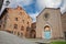 Lucignano, Arezzo, Tuscany, Italy: the medieval church of San Francesco and the ancient town hall Palazzo Pretorio in the center of the picturesque Tuscan town.