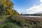 Photo of Autumn foliage warm colours on a beautiful sunny day at the park, Abbey Fields, Kenilworth, England.