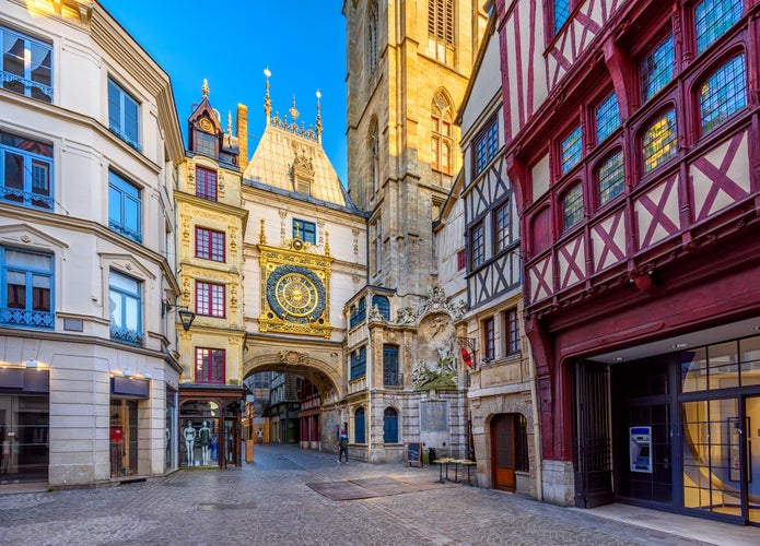 Photo of The Gros-Horloge (Great-Clock) is a fourteenth-century astronomical clock in Rouen, Normandy, France. Architecture and landmarks of Rouen. Cozy.