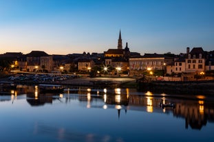 photo of the Bergerac town from bridge over Dordogne River in France.