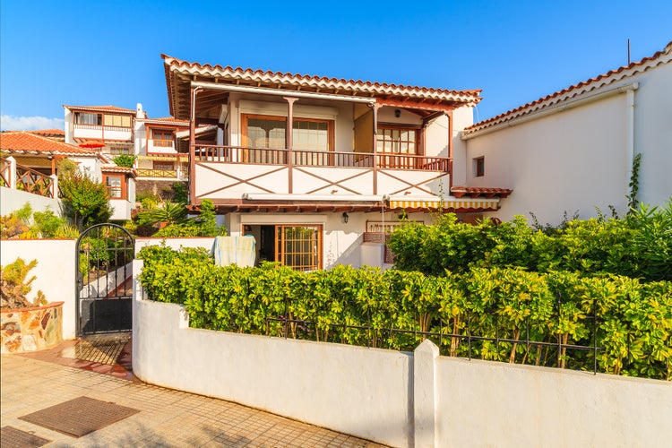 Traditional Canary style holiday apartments in Costa Adeje seaside town, Tenerife, Canary Islands, Spain