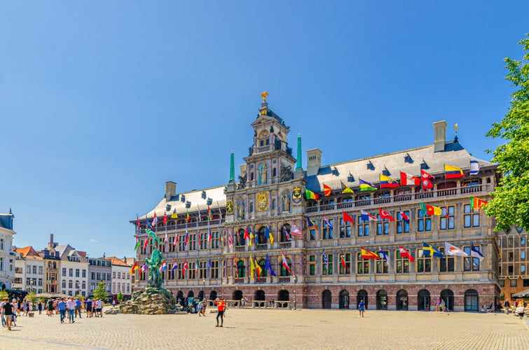 Antwerp City Hall Stadhuis Antwerpen Renaissance Architectural style building and Brabofontein Brabo Fountain on Big Market Square in Antwerp city historical centre, Antwerpen old town, Belgium