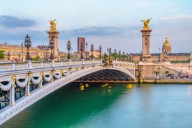 Photo of aerial view of Verona historical city centre, Ponte Pietra bridge across Adige river, Verona Cathedral, Duomo di Verona, red tiled roofs, Veneto Region, Italy.