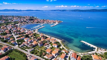 Photo of adriatic village of Bibinje harbor and waterfront panoramic view, Croatia.