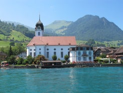 Photo of aerial View of the Settlement Ennetbürgen (Ennetburgen or Ennetbuergen), Buochs and Mountain Buochserhorn ,Canton of Nidwalden, Switzerland.