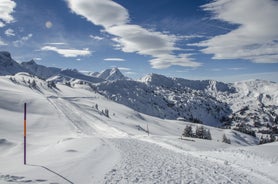 photo of an aerial view of Gstaad in winter. Village and holiday resort in the Swiss Alps.