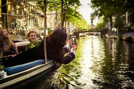 Amsterdamin 90 minuutin yksityinen kanavaristeily elävän oppaan ja juomien kanssa