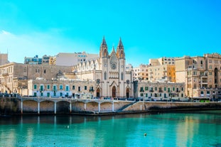 Photo of beautiful aerial view of the Spinola Bay, St. Julians and Sliema town on Malta.